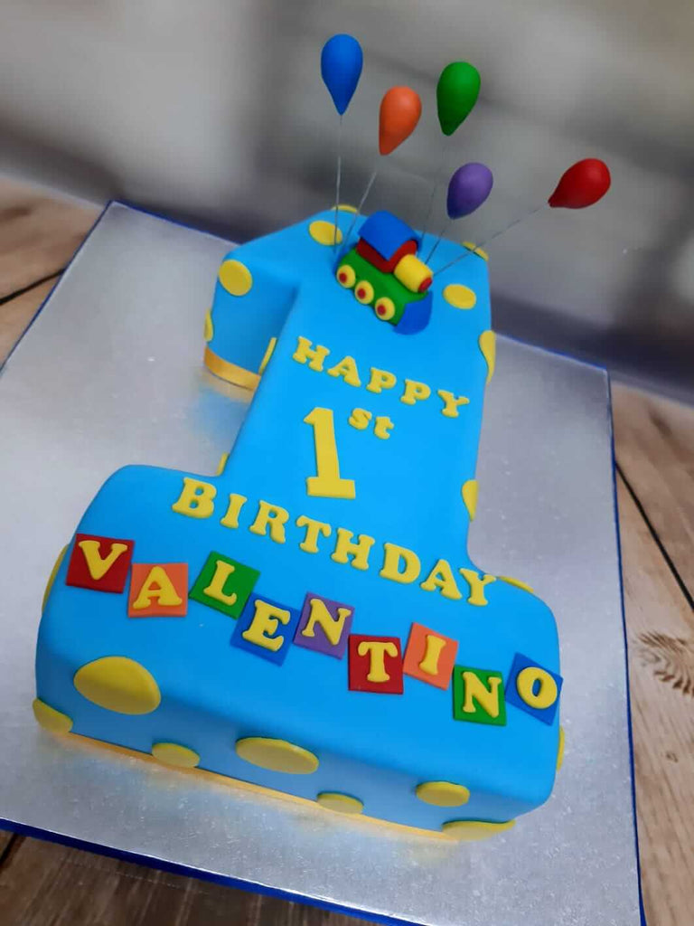 Balloons & Tassels First Birthday Cake - Dough and Cream