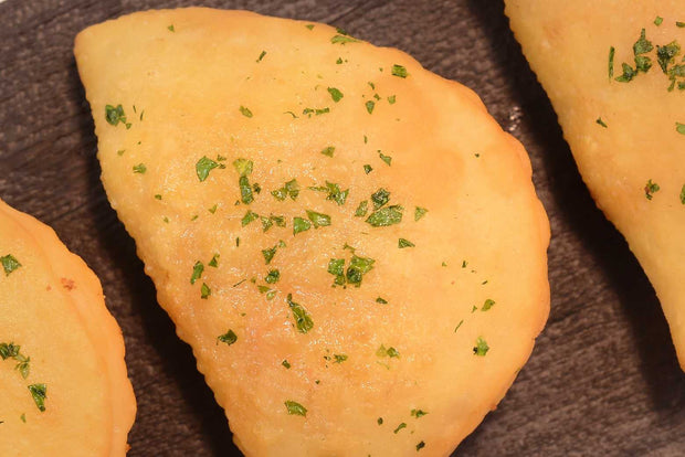 Tomato and mozorella panzarotti with olive oil and garlic - Mannarinu - 1